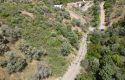 ULAMIŞTA KADASTROL YOL CEPHELİ DOĞA MANZARALI 5.500 m2 ZEYTİNLİK