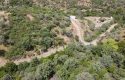 ULAMIŞTA KADASTROL YOL CEPHELİ DOĞA MANZARALI 5.500 m2 ZEYTİNLİK