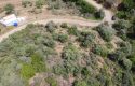 ULAMIŞTA KADASTROL YOL CEPHELİ DOĞA MANZARALI 5.500 m2 ZEYTİNLİK