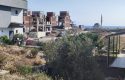 SEFERİHİSAR AKARCA’DA DENİZ VE DOĞA MANZARALI SATILIK ARSA