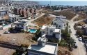 SEFERİHİSAR AKARCA’DA DENİZ VE DOĞA MANZARALI SATILIK ARSA