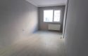 SEFERİHİSAR MERKEZİ KONUMDA ARA KAT DOĞALGAZLI KAPALI MUTFAK 3+1 KİRALIK DAİRE