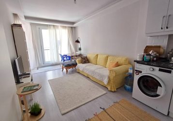 ŞİRİN-MİNİMALİST SEFERİHİSAR MERKEZİ KONUMDA ARA KAT 1+1 DAİRE