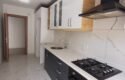 SEFERİHİSAR MERKEZ’DE 2+1 KAPALI MUTFAK ARA KAT SATILIK DAİRE